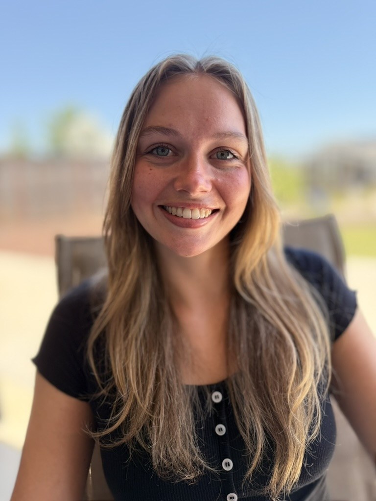 Sarah Wever smiling outdoors